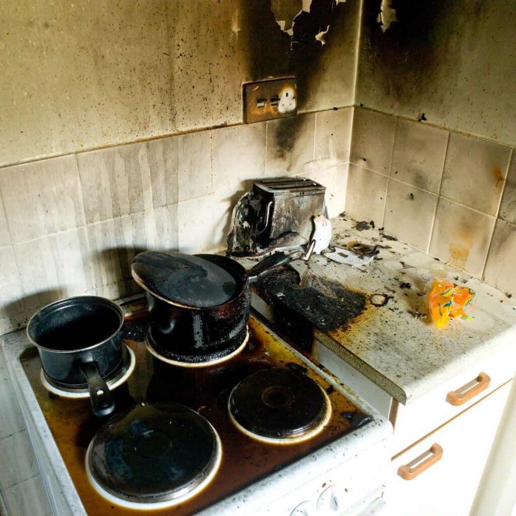 Cooking Fire Damage Restoration. Picture of a burned out stovetop.